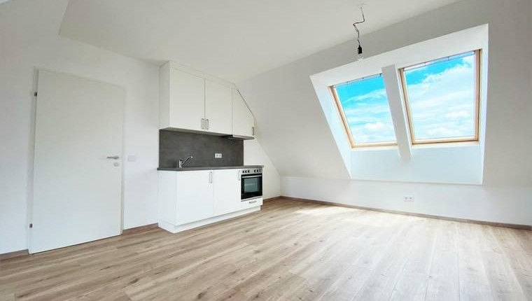 ERSTBEZUG: Sonniges Single-Appartement mit Dachterrasse