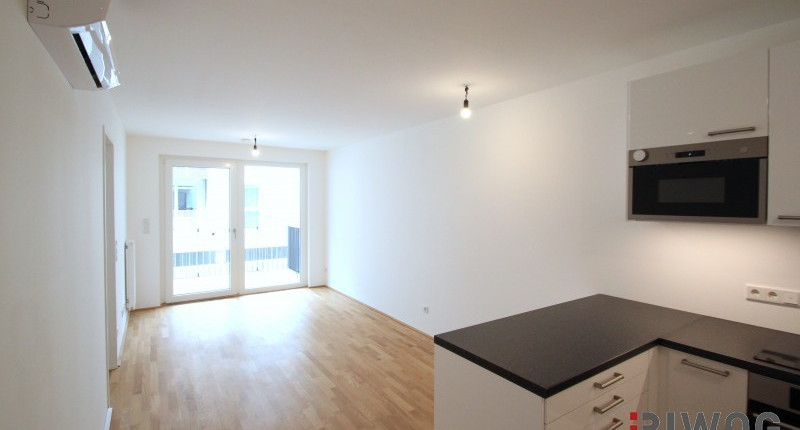 Klimatisierte 2-Zimmer-Erstbezugswohnung mit Balkon