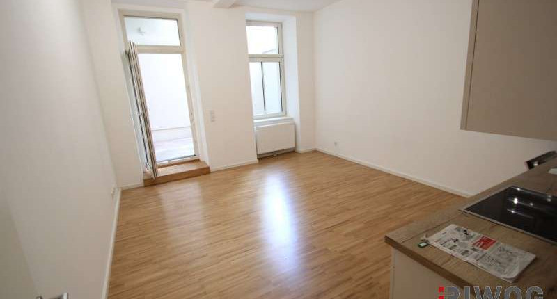 SANIERTE ERDGESCHOSSWOHNUNG MIT TERRASSE