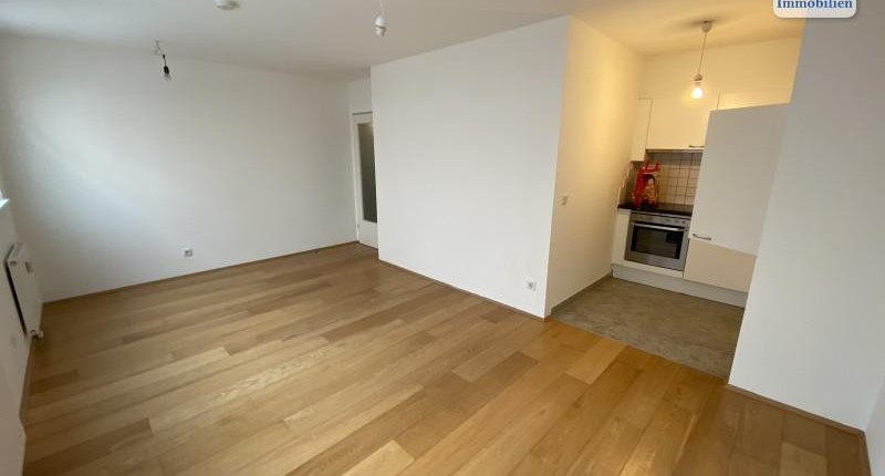 Helle Erdgeschoß-Neubauwohnung Nähe Stadthalle